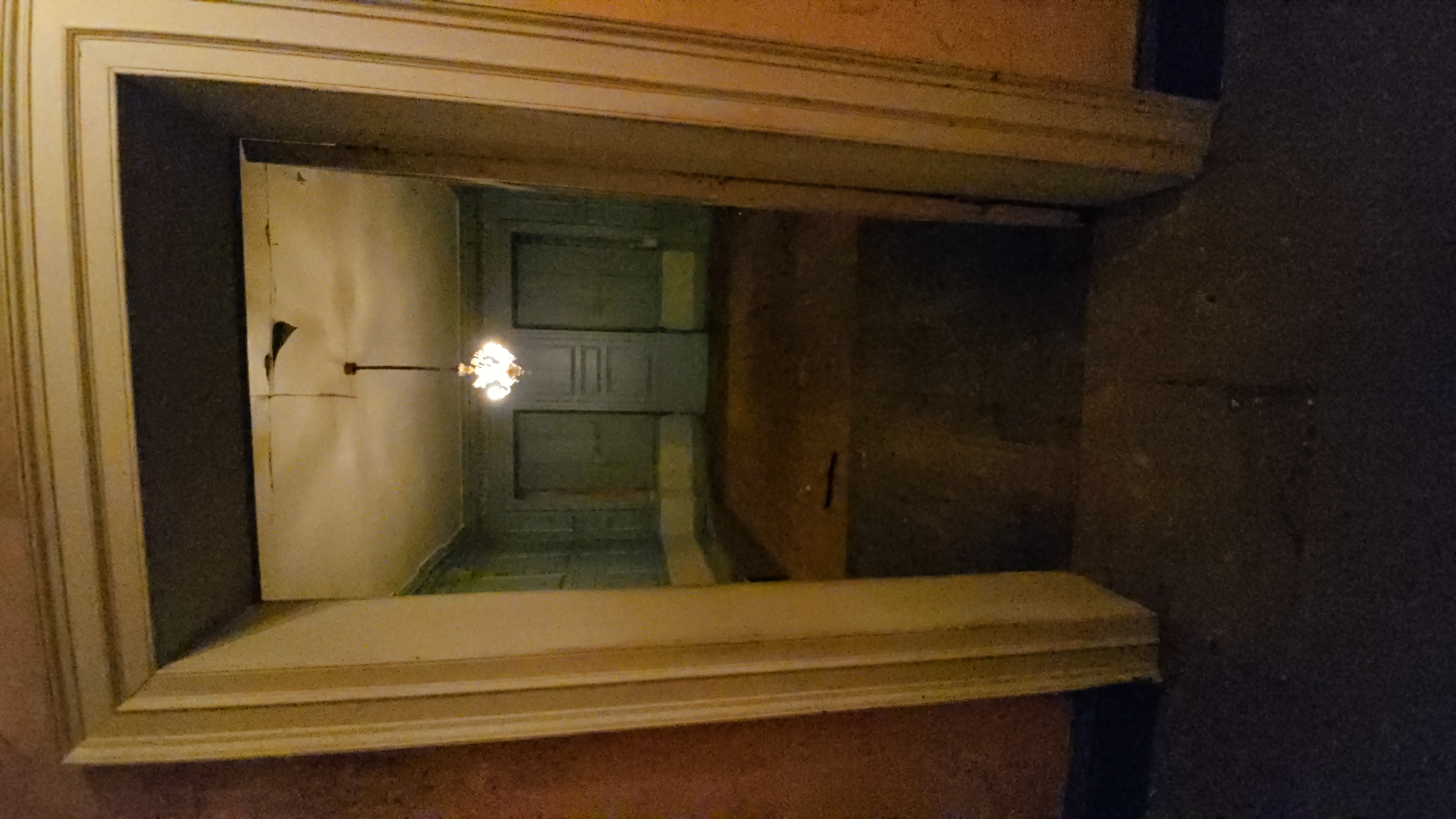 Original doorway and chandelier